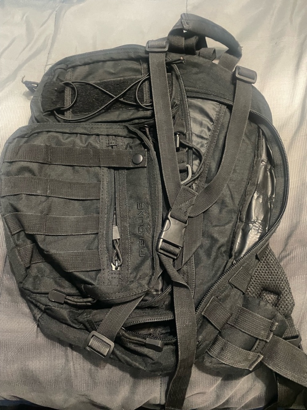 Black Tactical Backpack by FIELDLINE - Rugged Everyday Pack